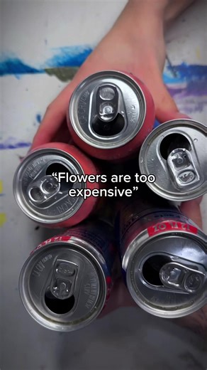 Creative Recycled Flower Art with Red Bull Cans