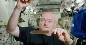 Astronaut plays water ping pong to celebrate 300th day in space
