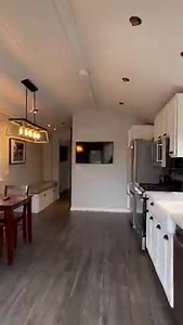 Take a look inside our Village Cottage! Quaint on the outside, cozy on the inside, this one-bedroom cabin has a queen-sized bed, a full-sized refrigerator and a refreshing A/C unit. Its separate bathroom features a walk-in shower. And its fully equipped kitchen features an oven, microwave & dishwasher. Dogs🐾: Up to 3 per accommodation Max Occupancy 🙂: 2 | Flying Flags RV Resort & Campground