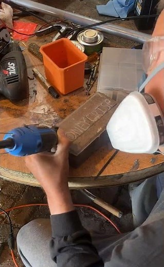 Engraving a paving stone with a rotary tool