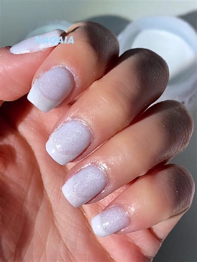 Stunning French Tip Nails with Shimmering Glow