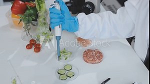 testing a plant sample in a biochemical science laboratory. a scientist studies the genetics of plants