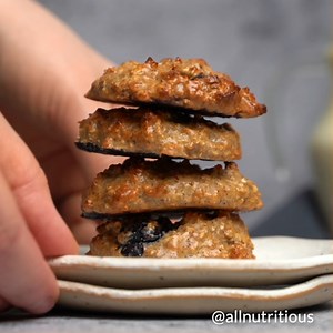 Sweet, chewy, and protein-packed oatmeal cookies with blueberries, oats, and almond butter - perfect for a healthy treat or quick energy boost. | All Nutritious