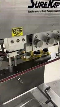 BID ON EQUIPMENT: Item: 440880 - 6 Spindle SUREKAP SK6000-15 Inline Screw Capper with Hopper