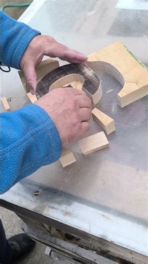 Wooden letter done with a scroll saw