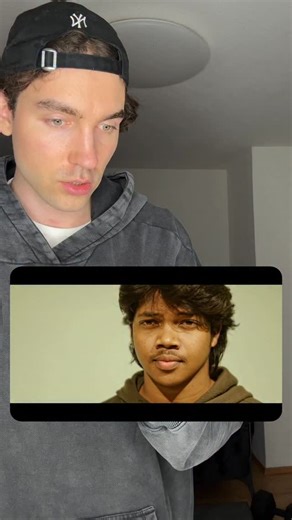 Kevin Winnik on Instagram: "Love this viral trend 👀 • Prompt: Create a cinematic digital illustration of the person in the reference photo. Maintain the exact face, identity, hairstyle, expression, skin tone, and pose with zero distortion. Transform the entire scene into a deep red high-contrast Tamil gangster movie poster style. Replace the background with red gradients, smoky atmosphere, and subtle textures. Add bold comic-book shading, thick outlines, strong black shadows, and glossy highlig