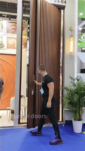 This 4-meterhigh off-axis door is simply wonderful.#doors #pivotdoor #aluminumdoors #door #villadoor