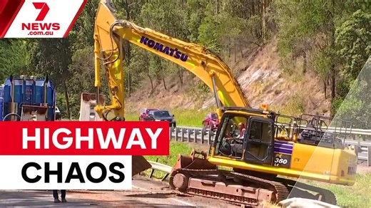 Truck smashes into Bruce Highway overpass
