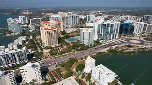 Panorama of City Sarasota FL. Beautiful beaches in Florida. Spring or summer vacations in Florida. Beautiful View on Hotels and Resorts on Island. America USA. Gulf of Mexico. Aerial travels video.