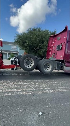 Frieghtliner M2 wrecker towing a Western Star semi truck