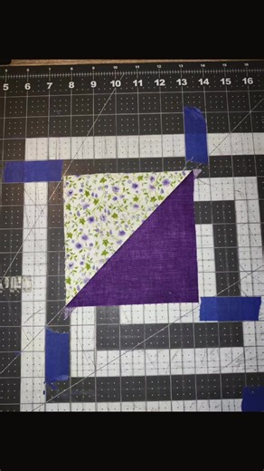 a beginning the purple quilt today was day one we made all of the purple flower and dark purple half square triangles tomorrow purple and purple half square triangles #purple #loveit #I don't know what I'm doing yet with this quilt