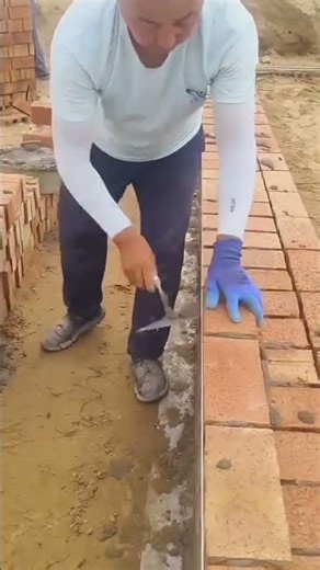 The process of installing red bricks in buildings using special techniques #shorts