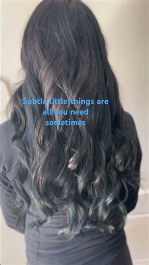 Blue highlights on dark brown hair 💙