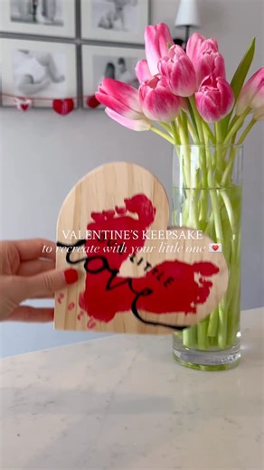 Mackenzie Hyland on Instagram: "Your sign to make this easy Valentine’s keepsake with your little one before Valentine’s Day ❤️ This is such an easy activity and it’s a keepsake you’ll love in your home for years to come! Such a cute way to remember how tiny your baby’s feet were 🥹 All you need is a wooden heart, red paint, a paint brush, and a paint pen! Comment ✨VALENTINE✨ and I’ll send you the details to the wooden heart we used so you can recreate your own! 💌 Send this to a mom friend who