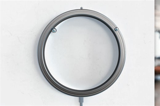 The magnetic levitating spheres of this abstract clock makes time-telling a futuristic experience! - Yanko Design