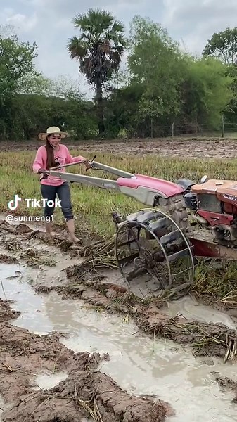Plowing a Muddy Field: Agricultural Techniques in Action