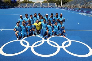 Indian cricketers celebrate the bronze medal for the men's hockey team at the 2021 Olympics