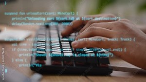 Close up man typing on keyboard with multiple layers of code