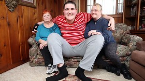 World's tallest teenager reaches 7ft 8ins - and he is still growing