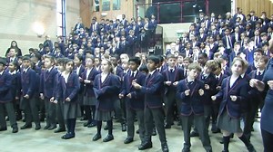 Middle and senior school children kicking off science week with a song about the planets after a fantastic assembly with some explosions and experiments to get us think | St. Aubyn's School