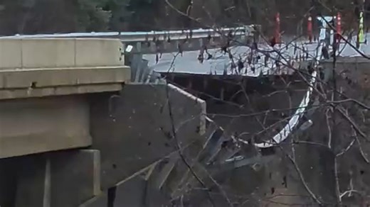 Moment bridge collapses as river overflows in Montana