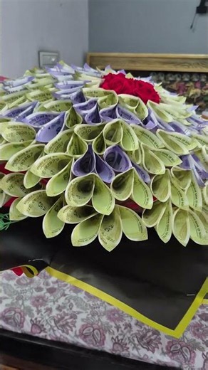 Money Art: Cash Notes Transformed into a Flower 🌺 ‪@KohinoorHampersHoops‬