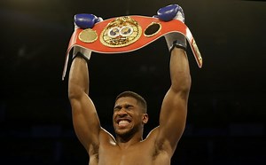 Joshua snatches IBF heavyweight belt off Martin in 2nd round