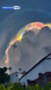 A rare cloud iridescence lights up dark clouds with a bright rainbow, showing nature’s colours even in the gloom. #CloudIridescence #NatureBeauty #RainbowClouds #PakistanTV PakistanTvglobal | Pakistan TV