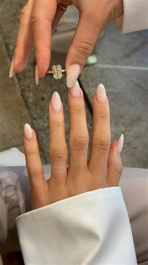 EAST WEST GEM CO. // on Instagram: "That’s right, this is not your standard bezel. Our open bezel setting eliminates half the bezel from the top and side view, and it might just be the sleekest bezel yet 🙌🏼 This client wanted to have our open bezel Luna setting around a gorgeous 3.55 carat old mine emerald and we couldn’t be more obsessed! -————————— #EASTWESTLUNA - 3.55 carat center (1.5 ratio) - 10.5x7mm old mine emerald, modern white moissanite set in a 14k yellow gold setting - 1.8mm solit