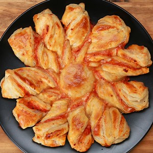 247K views · 1K reactions | Fancy a pizza twist rather than a slice?  RECIPE: https://tasty.co/search?q=Pizza+Puff+Pastry+Twists&sort=popular | Tasty UK | Facebook