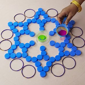 9.8M views · 66K reactions | Simple Rangoli Designs using Water Bottle Cap & Bangles I used Bottle Cap & Bangles to give Shape for Rangoli, Given Details using easily avilable things like Paint Brush, Glue Bottle and Colour powder. #rangoli #Simplerangoli #rangolibyjayanthig #satisfyingvideo #satisfying #relaxingvideo #relaxing #Hobbyideas #Easyrangoli #jayanthig | Simple Rangoli | Facebook