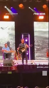 1.8M views · 50K reactions | ‘DEFINITION OF A COWARD’: Country singer Scotty McCreery showed his fans who’s boss after heroically stopping his show to call out a man who hit a woman in the crowd — and promptly had him removed. | Fox News | Facebook