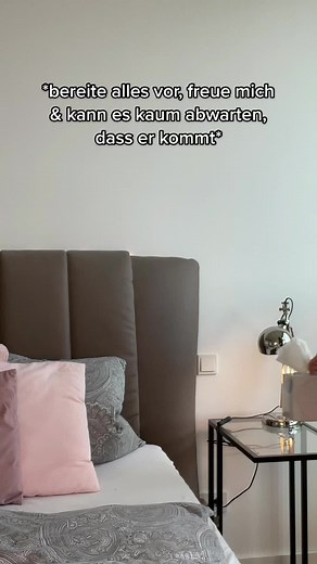 Applying Lip Makeup in a Modern Bedroom Setting