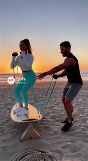 A male trainer at the beach is training a glamorous woman with fair skin and pretty face.