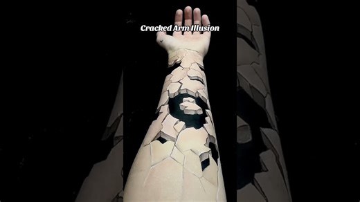 Unbelievable cracked arm illusion created with body art