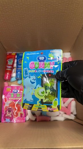 Packing Benjamin's Order with Toy Story and Monsters Inc Gummies