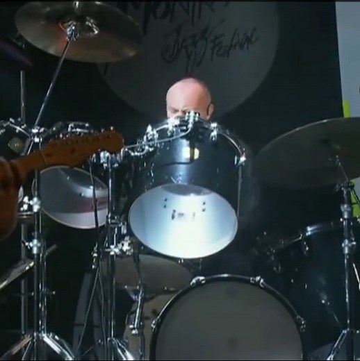 Phil Collins: Legendary Drummer Performing Live