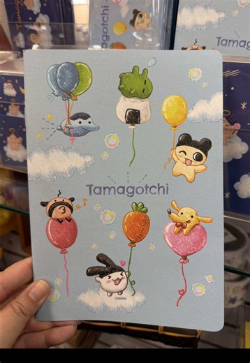Tamagotchi stationery collection at the Kinokuniya bookstore inside of Mitsuwa! I love the softer, almost watercolor like style of the characters. There were letter sets, notepads, pencil boxes, pens, notebooks, and keychains in this series by Bandai. #tamagotchi #stationery #heiseiretro #90sthrowback #journaling
