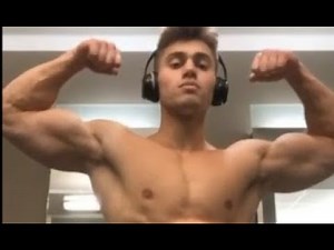 Aaron flexes his strong muscles