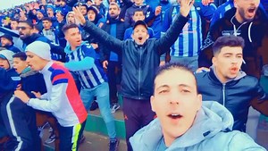 Energetic Sports Fans Cheering in Stadium