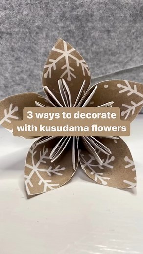 4.8K views | 3 ways to decorate with these easy to make, paper origami Kusudama flowers! Make flower ball ornaments, stack them in hurricanes or display them in shadow boxes. What other ways would you use them? See my reel tutorial to learn how to make these! #christmasdecor #paperflowers #easyorigami #diyornaments | Selene Builds Things | Facebook