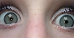 Young Girl Staring at Camera