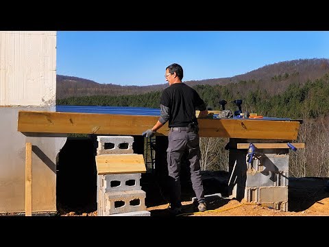 Elevated Concrete Porch Slab Construction: Finishing the Steel Beams and Installing Fascia Boards