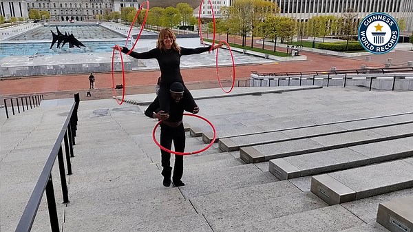 Hula-Hooping Heights, Andrea M. and Mr. O's Stair Climbing Record