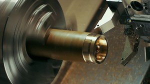 Man is shaping copper in cnc machine Premium Stock Video Footage