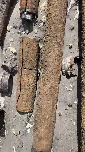 Cracked Cast Iron Sewer Pipes Removed During Under Slab Tunnel Plumbing Repair