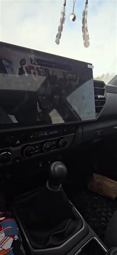 What happens when the CarTrimHome C12 Head Unit is paired with a subwoofer?