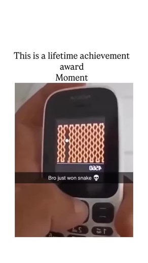 company on Instagram: "The video captures a rare perfect play of the classic Snake game on a Nokia phone, where the snake fills the entire screen without collision, a feat demanding flawless directional precision over 20+ seconds. Posted amid 2025's meme resurgence, it taps into nostalgia for early mobile gaming, amassing 936k views as users celebrate the skill akin to speedrunning records tracked by communities like TASVideos. Community responses, including "legend" and "triumph," underscore it