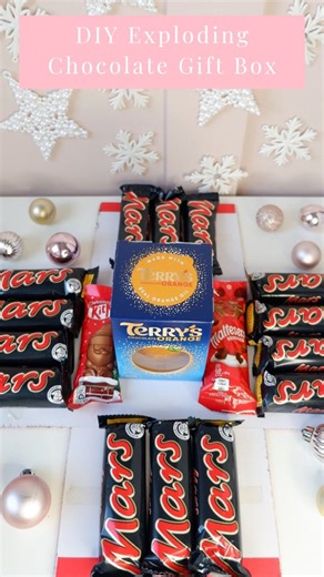 Gifts Wrapped Up on Instagram: "DIY chocolate exploding box Grab yourself a gift box from @poundland cut the sides use double sided tape to fill with chocolates my boys love Mars bars and there you have a fun way to gift their favourite chocolates this Christmas. What do you think? Will you be recreating this? Don't forget to save for later and share with a friend who would love this idea. . #giftidea #giftboxideas #diychristmasgifts #giftboxes #explodingbox #diygifts #diygift #diygiftideas #diy