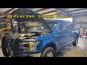 HOW TO REPLACE SPARK PLUGS ON A FORD F 150